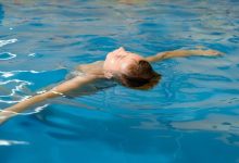 boy-swimming-indoor-pool-having-fun-swim-class_130111-4538-9991122